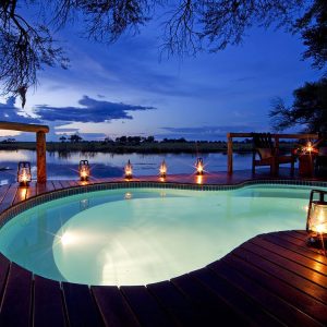 Kwando Lagoon Camp Pool by night