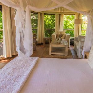 Nambwa Tented Lodge Suite bedroom with lounge